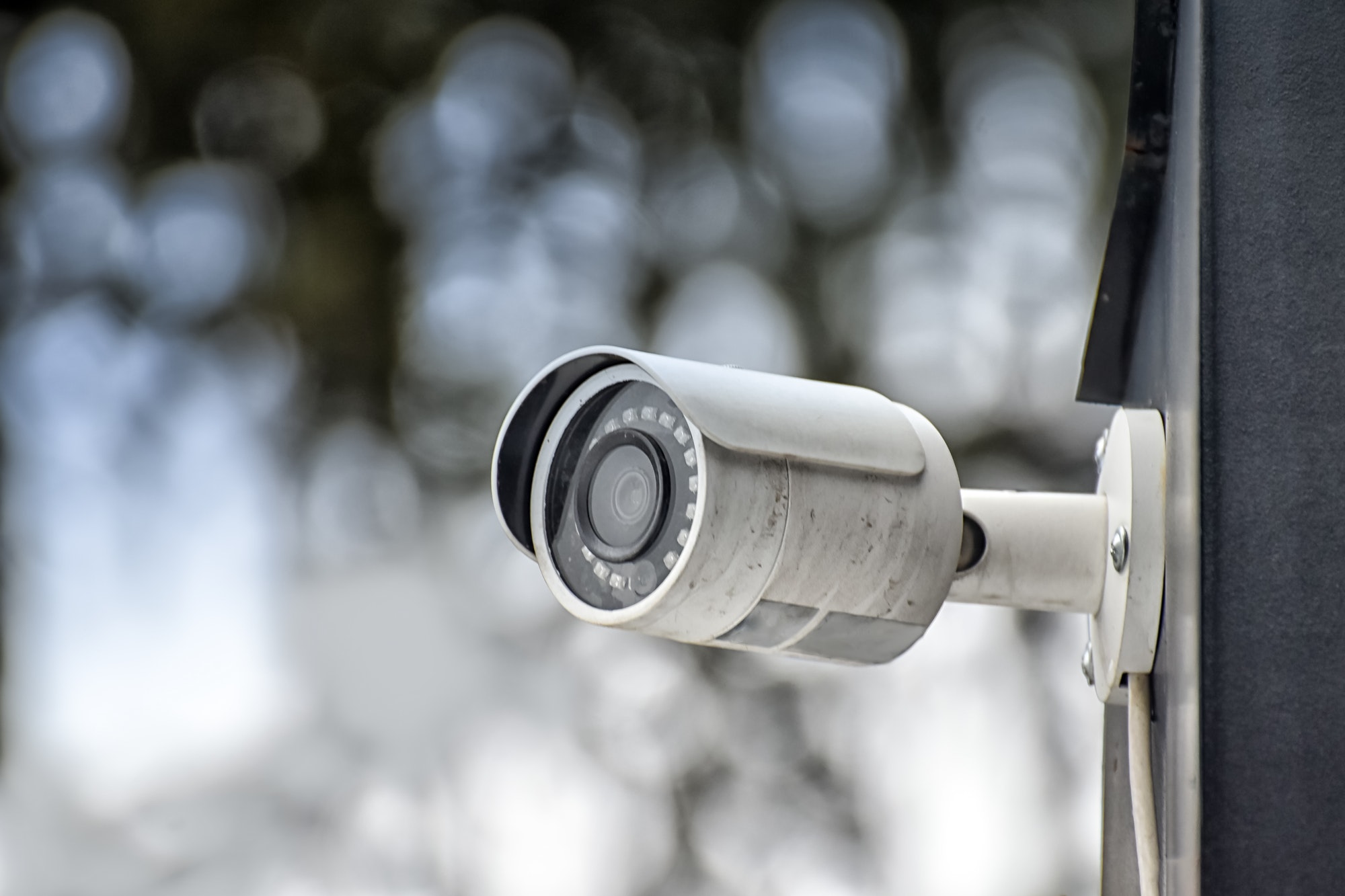 security system of outdoor video surveillance cctv security camera on blurred outdoors background .jpg